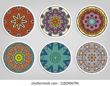 Decorative round ornaments set, isolated elements. Colorful mandala, stylized flower. Abstract geometric doodle patterns for plate decoration, fabric print,  business or greeting card design
