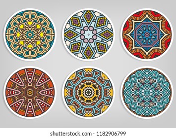 Decorative round ornaments set, isolated elements. Colorful mandala, stylized flower. Abstract geometric doodle patterns for plate decoration, fabric print,  business or greeting card design