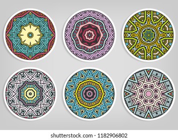 Decorative round ornaments set, isolated elements. Colorful mandala, stylized flower. Abstract geometric doodle patterns for plate decoration, fabric print,  business or greeting card design