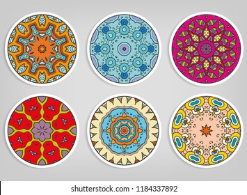 Decorative round ornaments set, isolated elements. Colorful mandala, stylized flower. Abstract geometric doodle patterns for plate decoration, fabric print,  business or greeting card design