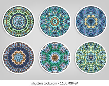 Decorative round ornaments set, isolated elements. Colorful mandala, stylized flower. Abstract geometric doodle patterns for plate decoration, fabric print,  business or greeting card design