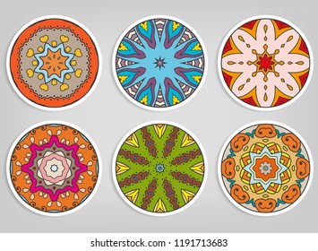 Decorative round ornaments set, isolated elements. Colorful mandala, stylized flower. Abstract geometric doodle patterns for plate decoration, fabric print,  business or greeting card design