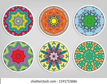 Decorative round ornaments set, isolated elements. Colorful mandala, stylized flower. Abstract geometric doodle patterns for plate decoration, fabric print,  business or greeting card design