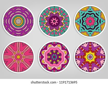Decorative round ornaments set, isolated elements. Colorful mandala, stylized flower. Abstract geometric doodle patterns for plate decoration, fabric print,  business or greeting card design