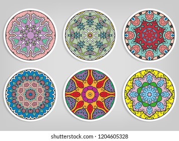 Decorative round ornaments set, isolated elements. Colorful mandala, stylized flower. Abstract geometric doodle patterns for plate decoration, fabric print,  business or greeting card design