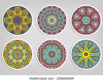 Decorative round ornaments set, isolated elements. Colorful mandala, stylized flower. Abstract geometric doodle patterns for plate decoration, fabric print,  business or greeting card design