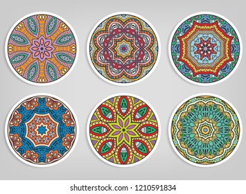 Decorative round ornaments set, isolated elements. Colorful mandala, stylized flower. Abstract geometric doodle patterns for plate decoration, fabric print,  business or greeting card design