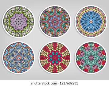 Decorative round ornaments set, isolated elements. Colorful mandala, stylized flower. Abstract geometric doodle patterns for plate decoration, fabric print,  business or greeting card design