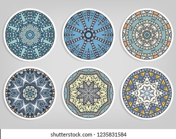 Decorative round ornaments set, isolated elements. Colorful mandala, stylized flower. Abstract geometric doodle patterns for plate decoration, fabric print,  business or greeting card design
