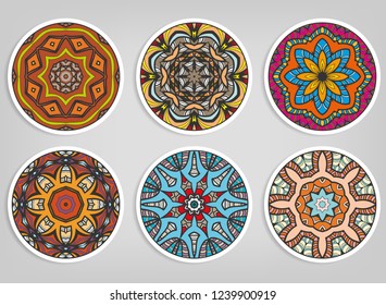 Decorative round ornaments set, isolated elements. Colorful mandala, stylized flower. Abstract geometric doodle patterns for plate decoration, fabric print,  business or greeting card design