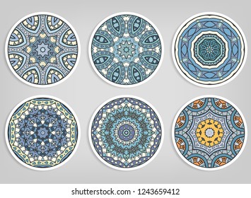 Decorative round ornaments set, isolated elements. Colorful mandala, stylized flower. Abstract geometric doodle patterns for plate decoration, fabric print,  business or greeting card design