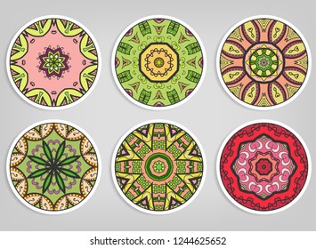 Decorative round ornaments set, isolated elements. Colorful mandala, stylized flower. Abstract geometric doodle patterns for plate decoration, fabric print,  business or greeting card design