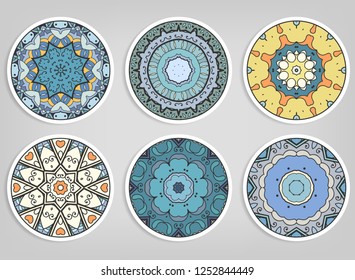 Decorative round ornaments set, isolated elements. Colorful mandala, stylized flower. Abstract geometric doodle patterns for plate decoration, fabric print,  business or greeting card design
