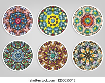 Decorative round ornaments set, isolated elements. Colorful mandala, stylized flower. Abstract geometric doodle patterns for plate decoration, fabric print,  business or greeting card design