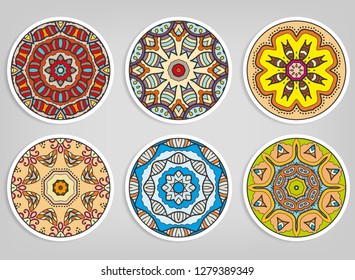 Decorative round ornaments set, isolated elements. Colorful mandala, stylized flower. Abstract geometric doodle patterns for plate decoration, fabric print,  business or greeting card design