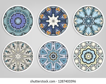 Decorative round ornaments set, isolated elements. Colorful mandala, stylized flower. Abstract geometric doodle patterns for plate decoration, fabric print,  business or greeting card design
