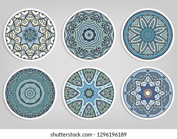 Decorative round ornaments set, isolated elements. Colorful mandala, stylized flower. Abstract geometric doodle patterns for plate decoration, fabric print,  business or greeting card design