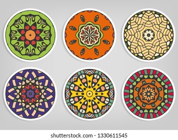 Decorative round ornaments set, isolated elements. Colorful mandala, stylized flower. Abstract geometric doodle patterns for plate decoration, fabric print,  business or greeting card design