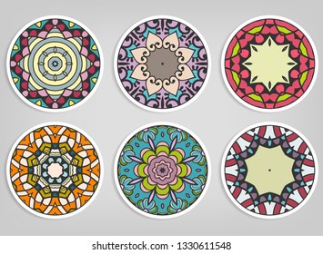 Decorative round ornaments set, isolated elements. Colorful mandala, stylized flower. Abstract geometric doodle patterns for plate decoration, fabric print,  business or greeting card design