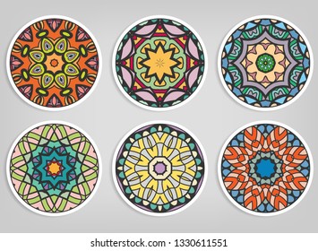 Decorative round ornaments set, isolated elements. Colorful mandala, stylized flower. Abstract geometric doodle patterns for plate decoration, fabric print,  business or greeting card design