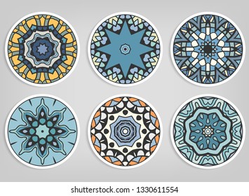 Decorative round ornaments set, isolated elements. Colorful mandala, stylized flower. Abstract geometric doodle patterns for plate decoration, fabric print,  business or greeting card design