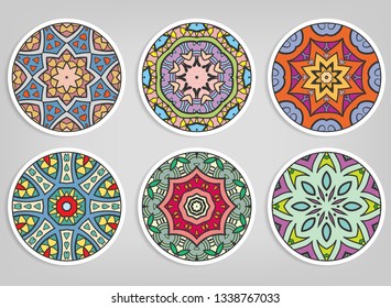 Decorative round ornaments set, isolated elements. Colorful mandala, stylized flower. Abstract geometric doodle patterns for plate decoration, fabric print,  business or greeting card design