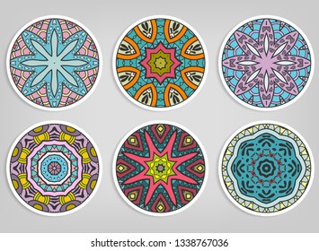 Decorative round ornaments set, isolated elements. Colorful mandala, stylized flower. Abstract geometric doodle patterns for plate decoration, fabric print,  business or greeting card design