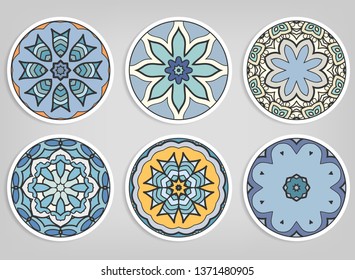 Decorative round ornaments set, isolated elements. Colorful mandala, stylized flower. Abstract geometric doodle patterns for plate decoration, fabric print,  business or greeting card design