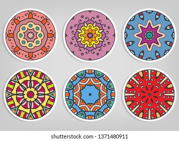Decorative round ornaments set, isolated elements. Colorful mandala, stylized flower. Abstract geometric doodle patterns for plate decoration, fabric print,  business or greeting card design
