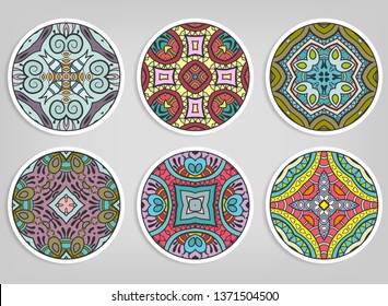 Decorative round ornaments set, isolated elements. Colorful mandala, stylized flower. Abstract geometric doodle patterns for plate decoration, fabric print,  business or greeting card design