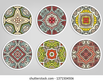Decorative round ornaments set, isolated elements. Colorful mandala, stylized flower. Abstract geometric doodle patterns for plate decoration, fabric print,  business or greeting card design