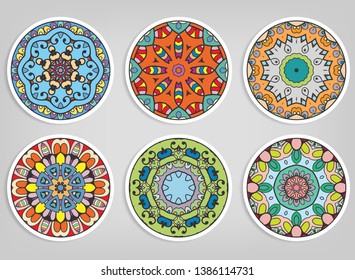 Decorative round ornaments set, isolated elements. Colorful mandala, stylized flower. Abstract geometric doodle patterns for plate decoration, fabric print,  business or greeting card design