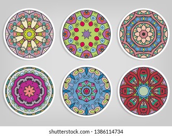 Decorative round ornaments set, isolated elements. Colorful mandala, stylized flower. Abstract geometric doodle patterns for plate decoration, fabric print,  business or greeting card design