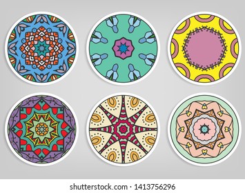 Decorative round ornaments set, isolated elements. Colorful mandala, stylized flower. Abstract geometric doodle patterns for plate decoration, fabric print,  business or greeting card design