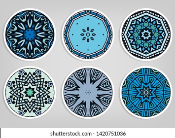 Decorative round ornaments set, isolated elements. Colorful mandala, stylized flower. Abstract geometric doodle patterns for plate decoration, fabric print,  business or greeting card design