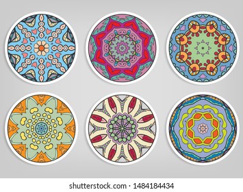 Decorative round ornaments set, isolated elements. Colorful mandala, stylized flower. Abstract geometric doodle patterns for plate decoration, fabric print,  business or greeting card design