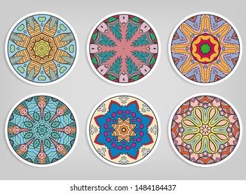 Decorative round ornaments set, isolated elements. Colorful mandala, stylized flower. Abstract geometric doodle patterns for plate decoration, fabric print,  business or greeting card design