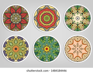 Decorative round ornaments set, isolated elements. Colorful mandala, stylized flower. Abstract geometric doodle patterns for plate decoration, fabric print,  business or greeting card design