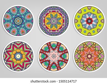 Decorative round ornaments set, isolated elements. Colorful mandala, stylized flower. Abstract geometric doodle patterns for plate decoration, fabric print,  business or greeting card design