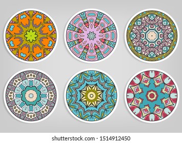 Decorative round ornaments set, isolated elements. Colorful mandala, stylized flower. Abstract geometric doodle patterns for plate decoration, fabric print,  business or greeting card design