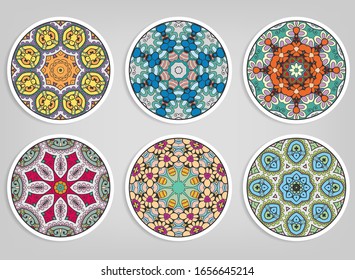 Decorative round ornaments set, isolated elements. Colorful mandala, stylized flower. Abstract geometric doodle patterns for plate decoration, fabric print,  business or greeting card design