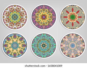 Decorative round ornaments set, isolated elements. Colorful mandala, stylized flower. Abstract geometric doodle patterns for plate decoration, fabric print,  business or greeting card design
