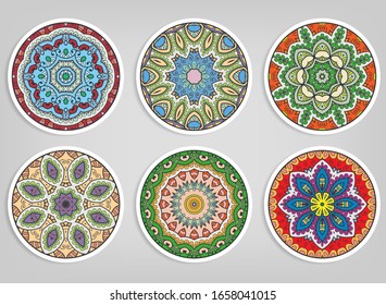 Decorative round ornaments set, isolated elements. Colorful mandala, stylized flower. Abstract geometric doodle patterns for plate decoration, fabric print,  business or greeting card design