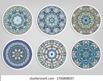 Decorative round ornaments set, isolated elements. Colorful mandala, stylized flower. Abstract geometric doodle patterns for plate decoration, fabric print,  business or greeting card design