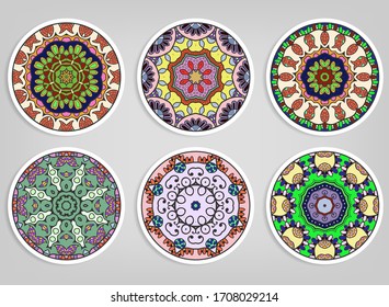 Decorative round ornaments set, isolated elements. Colorful mandala, stylized flower. Abstract geometric doodle patterns for plate decoration, fabric print,  business or greeting card design