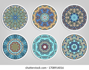 Decorative round ornaments set, isolated elements. Colorful mandala, stylized flower. Abstract geometric doodle patterns for plate decoration, fabric print,  business or greeting card design