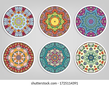 Decorative round ornaments set, isolated elements. Colorful mandala, stylized flower. Abstract geometric doodle patterns for plate decoration, fabric print,  business or greeting card design