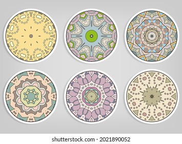 Decorative round ornaments set, isolated elements. Colorful mandala, stylized flower. Abstract geometric doodle patterns for plate decoration, fabric print,  business or greeting card design