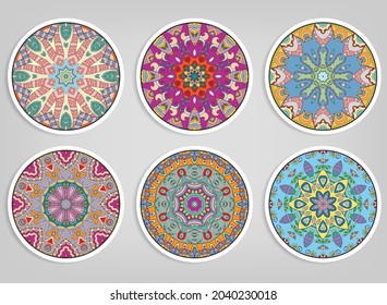 Decorative round ornaments set, isolated elements. Colorful mandala, stylized flower. Abstract geometric doodle patterns for plate decoration, fabric print,  business or greeting card design