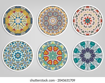 Decorative round ornaments set, isolated elements. Colorful mandala, stylized flower. Abstract geometric doodle patterns for plate decoration, fabric print,  business or greeting card design